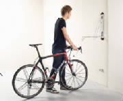 Step 1 Squeeze Rear Brake Handle and Pull Bike Upright